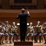 Orchestra representing AI agent automation symphony